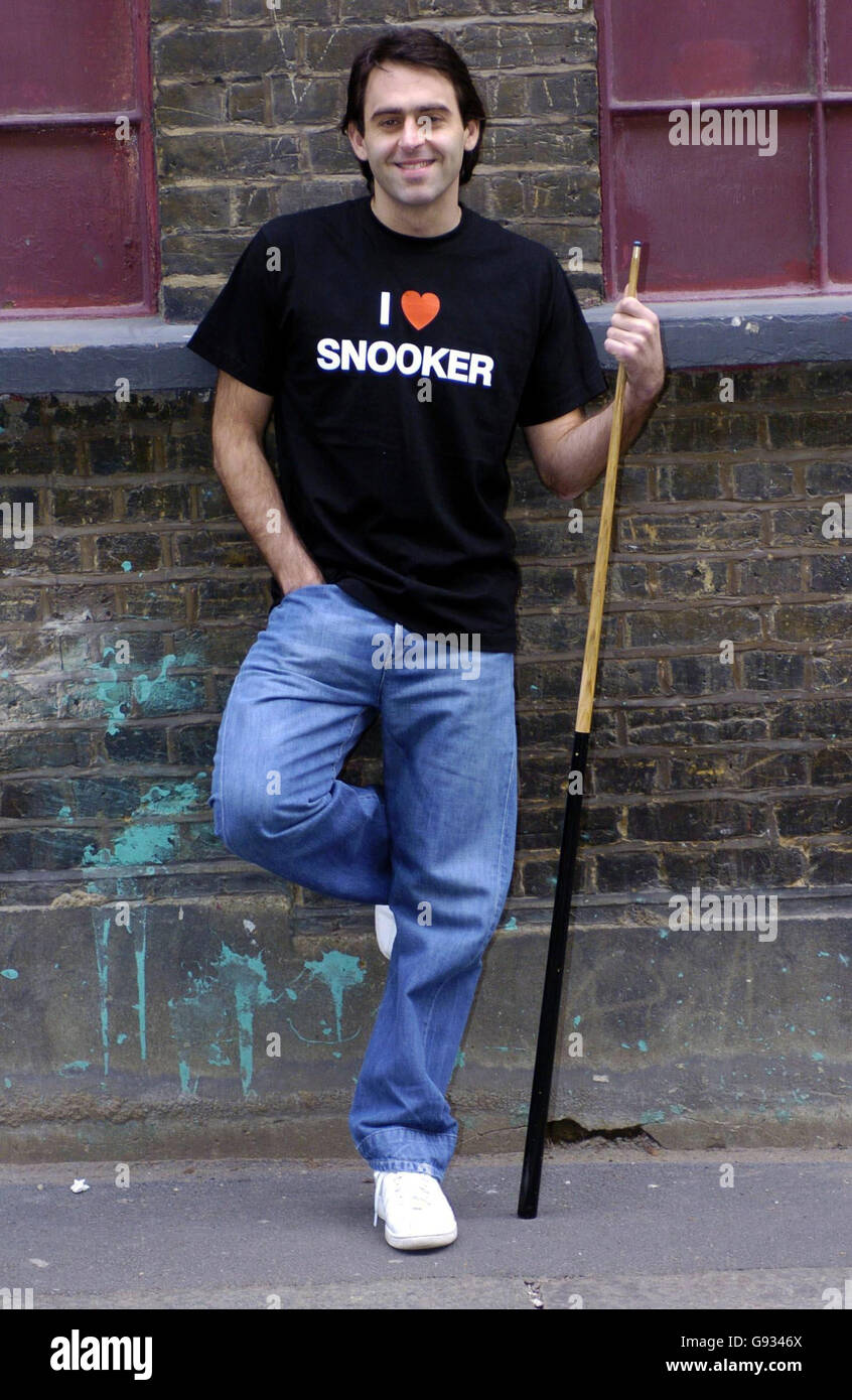 Snooker champion Ronnie OSullivan poses for the media during a photo-call in London, ahead of the Masters Snooker Tournment which starts on Sunday Stock Photo