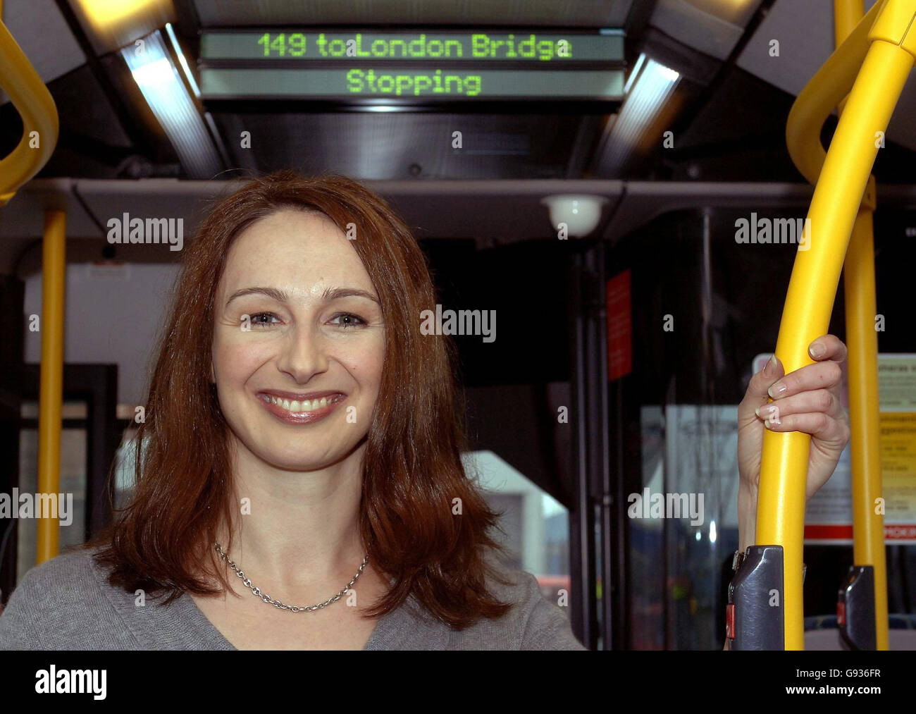 Radio presenter Emma Hignett stands inside a number 149 bus at the Tottenham bus depot, in North London, Tuesday January 17, 2006. Emma was at the depot to promote a pilot test for the route, which will use her voice to announce for the bus stops as they are approached. She will be heard announcing each stop and also the bus's eventual destination during an eight-week trial which will start shortly on five bendy buses. See PA Story TRANSPORT Buses. PRESS ASSOCIATION Photo. Photo credit should read: John Stillwell/PA Stock Photo