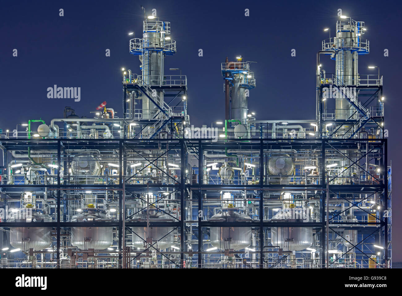Illuminated industrial installation at night Stock Photo Alamy