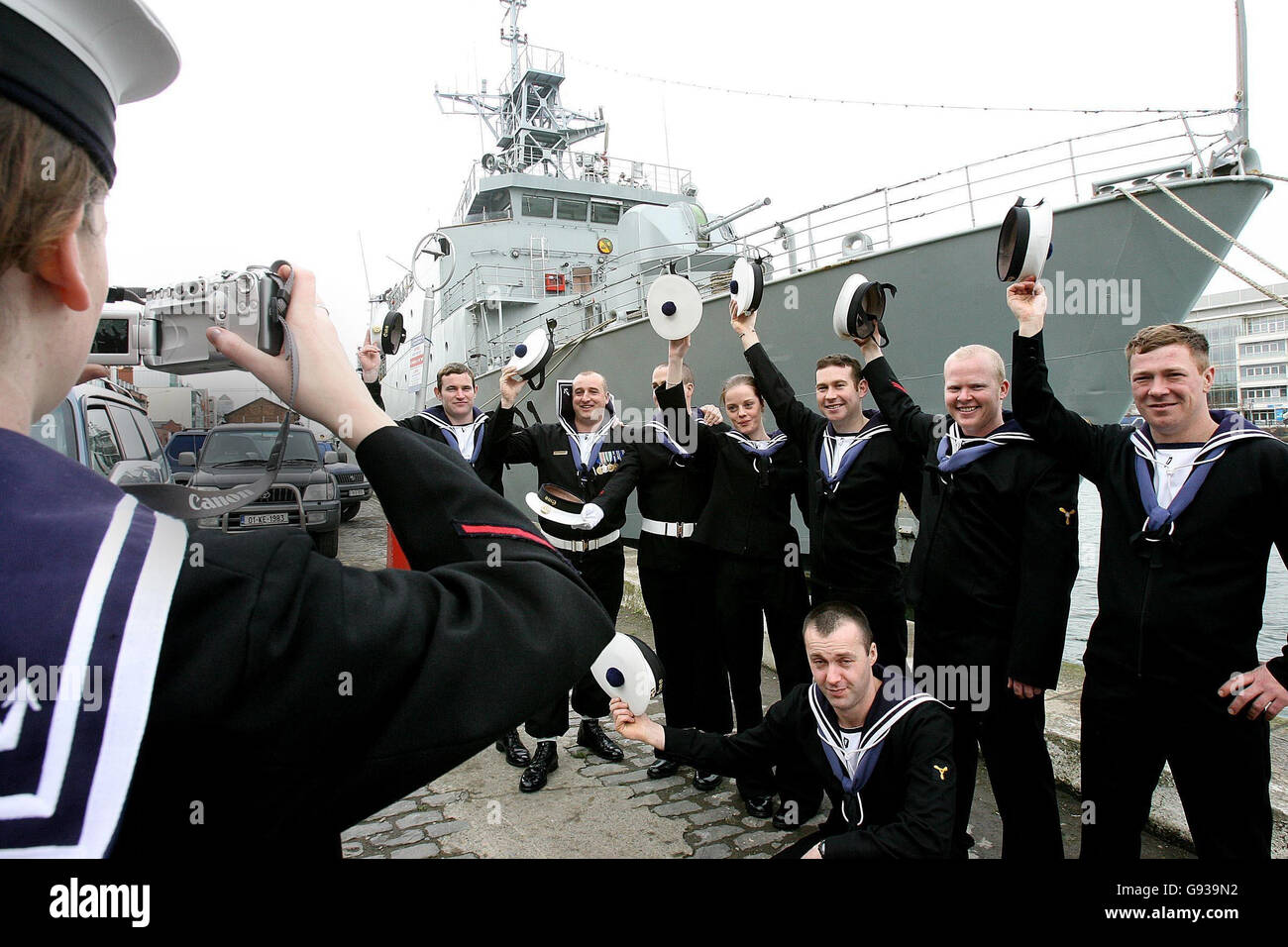 Communications Officer Tracie Wilkes photographs sailors from the Irish Naval Vessel LE Eithne in Dublin, Wednesday January 18, 2006, after it was announced that they are being deployed to South America. Commander Mark Mellet will be taking the LE Eithne's helm on next month's voyage to South America where Admiral William Brown's defence of Argentina's shores in 1814 made him a national hero. See PA Story SOCIAL Argentina Ireland. PRESS ASSOCIATION Photo. Photo credit should read: Julien Behal/PA Stock Photo