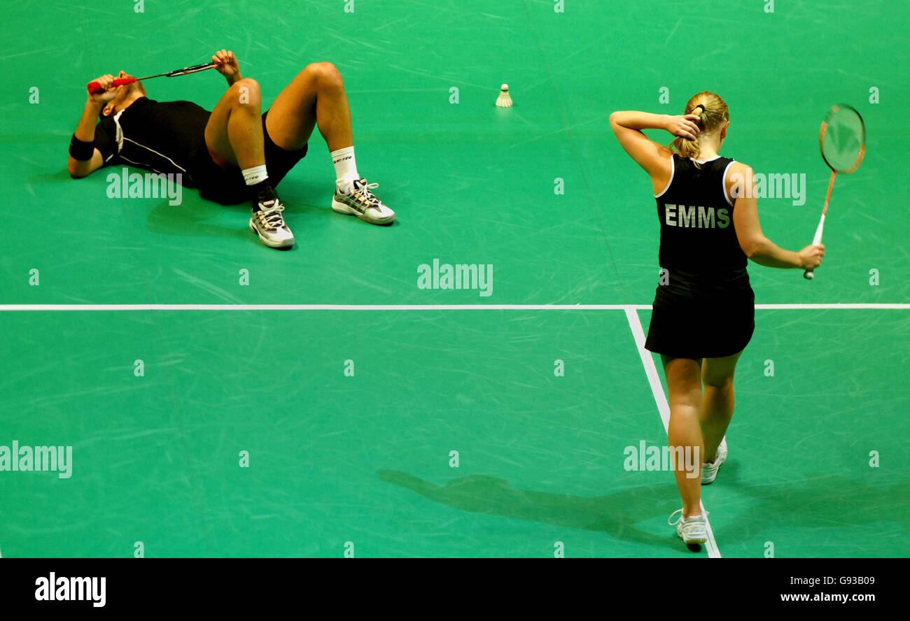 Great Britain's Nathan Robertson (top) and Gail Emms show their dejection after losing a point in the third set against China's Zhang Jun and Gao Ling during the mixed doubles final of the Yonex All-England Championships in Birmingham, Sunday January 22, 2006. PRESS ASSOCIATION Photo. Photo credit should read: Rui Vieira/PA. Stock Photo