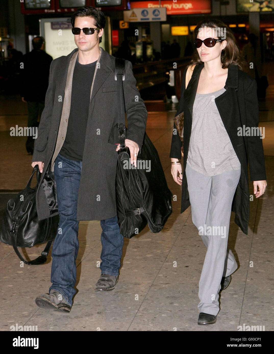 Brad Pitt and Angelina Jolie at Heathrow Airport, where they are due to leave the UK on a flight to Zurich, Wednesday January 25, 2006. PRESS ASSOCIATION PHOTO. Photo credit should read: Tim Ockenden/PA Stock Photo
