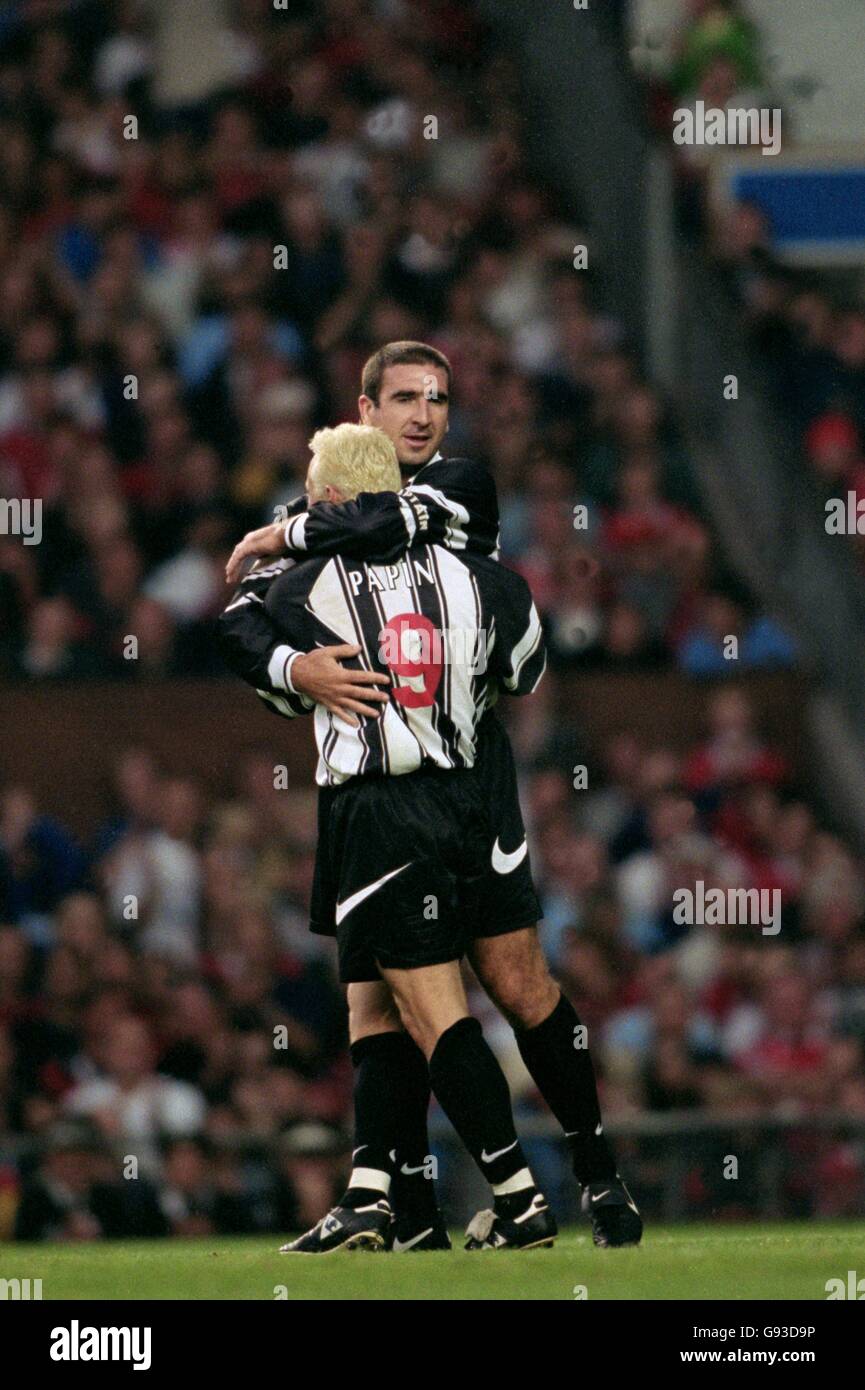 Cantona XI's Jean Pierre Papin (front) celebrates with Eric