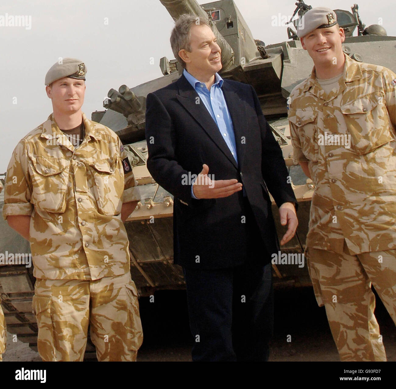 Library filer dated 22/12/2005 of British Prime Minister Tony Blair meeting Corporal Gordon Pritchard (right) at Basrah airbase, Iraq. Cpl Pritchard is the 100th member of the armed forces to die since the Iraq war began and was killed Tuesday when the Land Rover he was travelling in was hit by a roadside bomb. The 31-year-old was one of a number of servicemen and women who chatted to Mr Blair only days before Christmas at Shaibah logistics base. See PA story DEFENCE Iraq. PRESS ASSOCIATION Photo. Photo credit should read:Stefan Rousseau/PA. Stock Photo