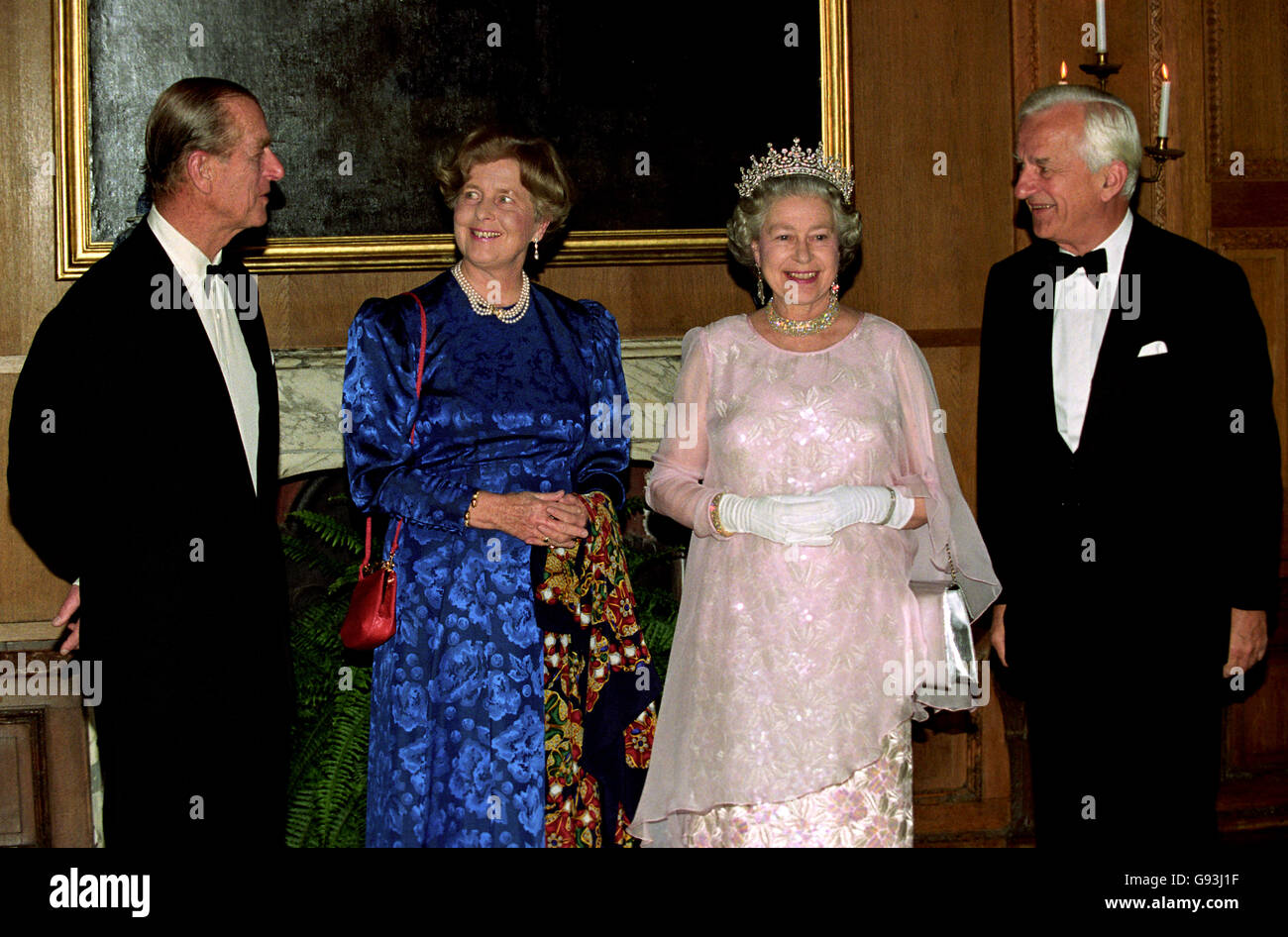 Queen Elizabeth II with Dr Richard von Weizsacker, President of Germany and his wife, Marianne and the Duke of Edinburgh at Schloss Charlottenburg before a state banquet. Stock Photo