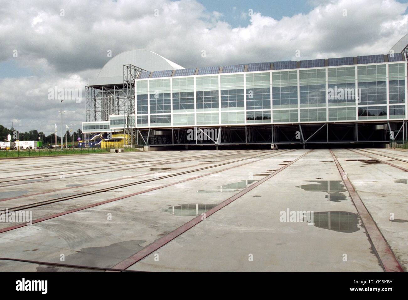 The exterior of the Gelre Dome, home of Vitesse Arnhem, showing the tracks that the pitch is moved on so that it can receive sunlight The Gelre Dome, Stadium home of Vitesse Arnhem Gelredome Stock Photo