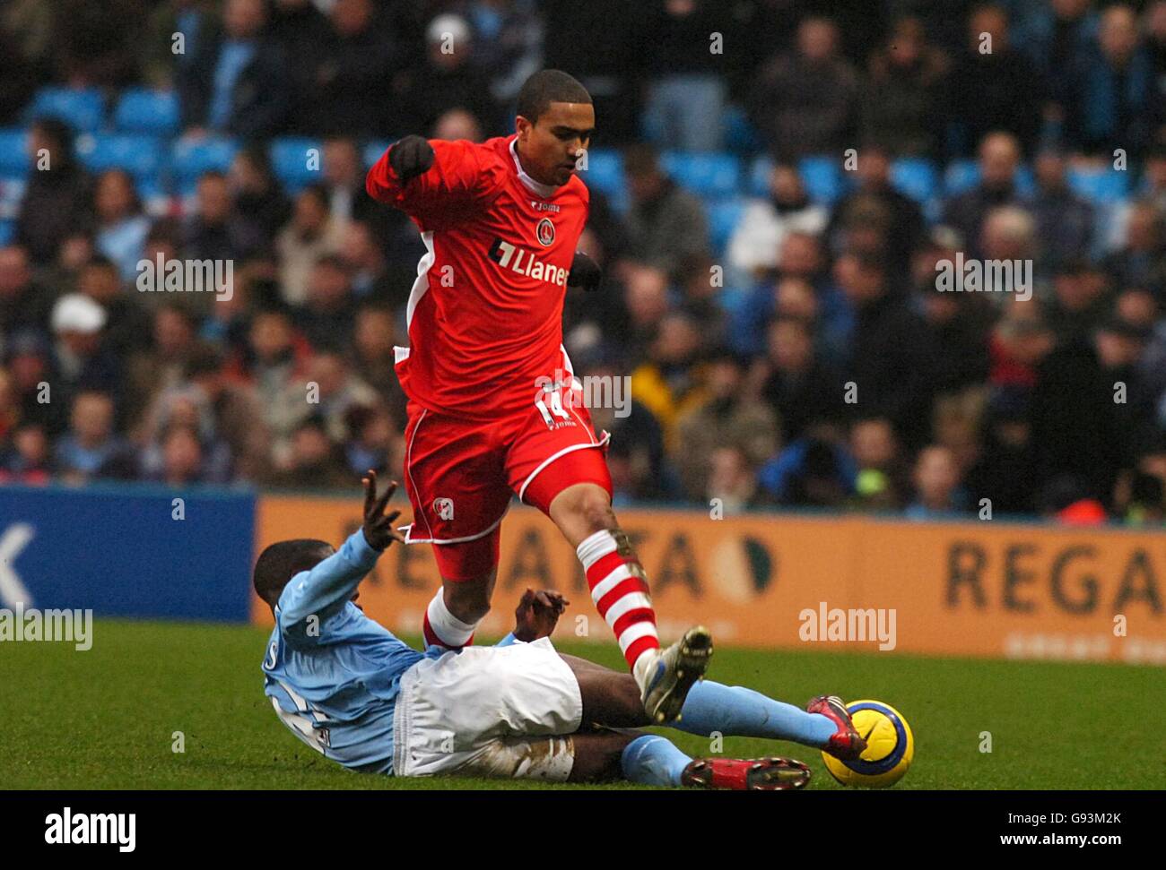 Slide tackle football hires stock photography and images Alamy