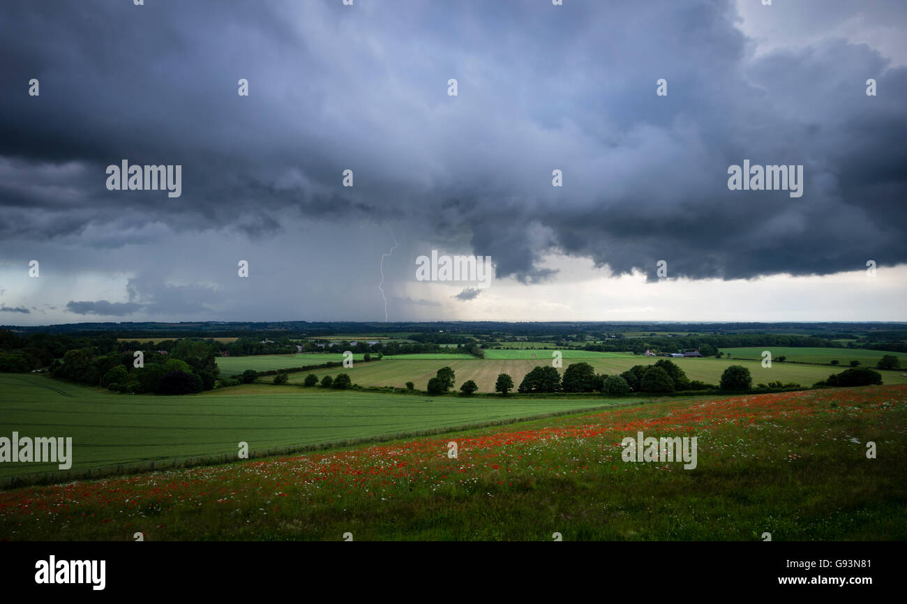 A lightning strike in the passing storm on the Kent Downs near Hythe. Stock Photo