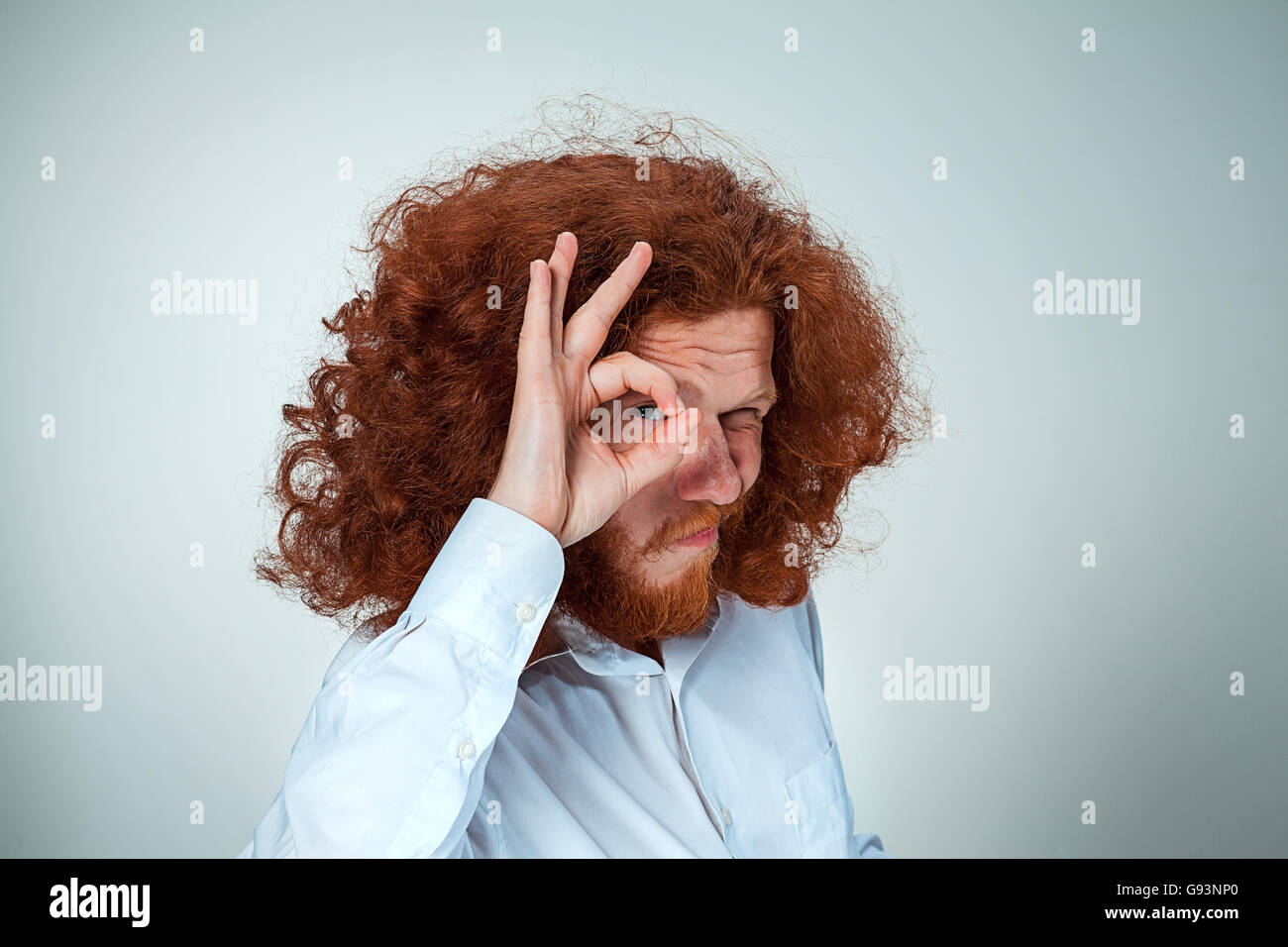 The young man looking at camera Stock Photo - Alamy