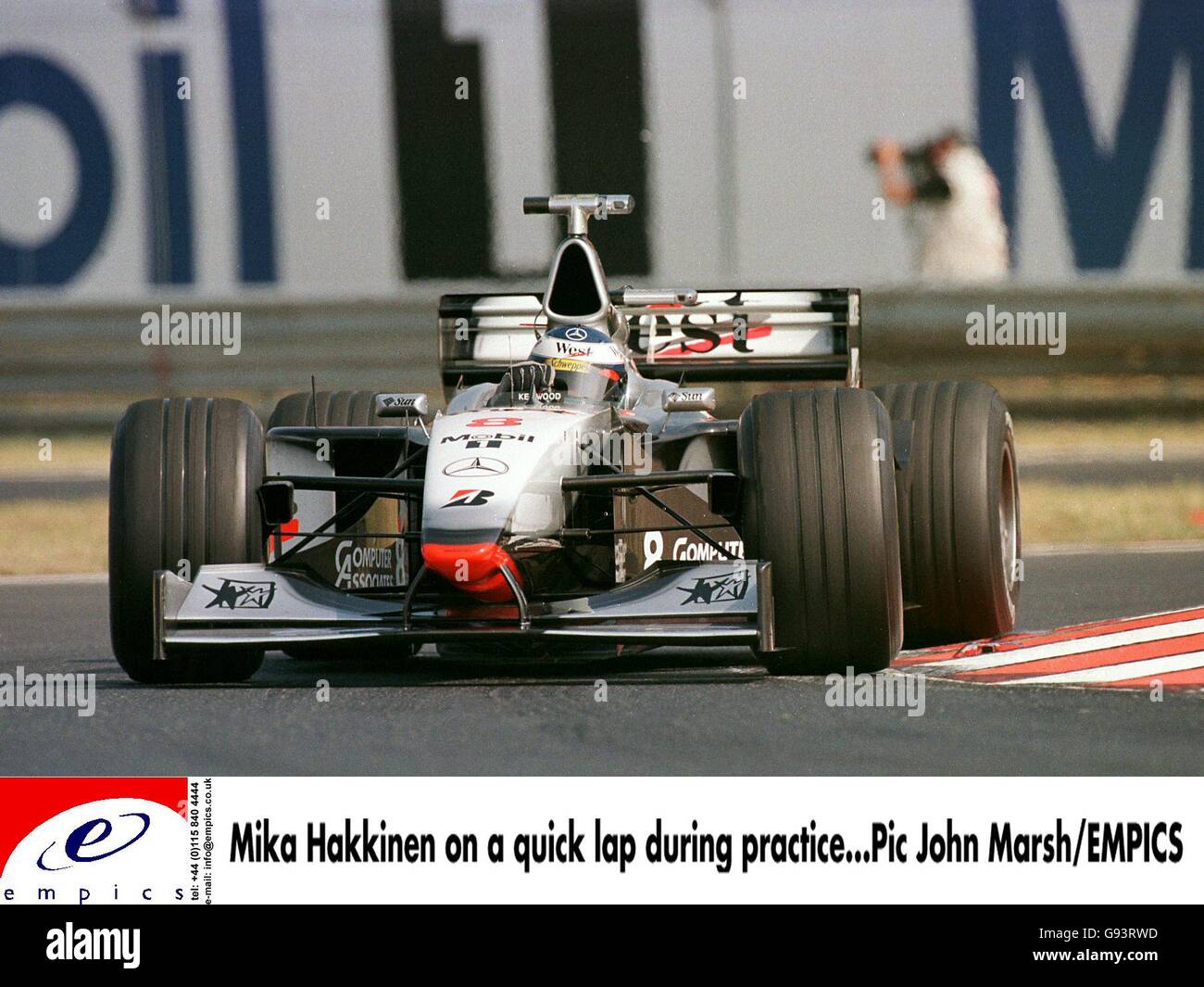 Mika hakkinen on a quick lap during practice hi-res stock photography