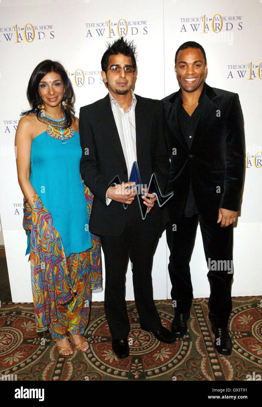 Winner of the Decibel Award, Madani Younis (Centre) with guest presenter Shobna Gulati and Ray Fearon at the 10th annual South Bank Show Awards, rewarding excellence in everything from opera to pop music and literature to visual art, at the Savoy, central London, Friday 27 January 2006. PRESS ASSOCIATION Photo. Photo credit should read: Steve Parsons/PA Stock Photo