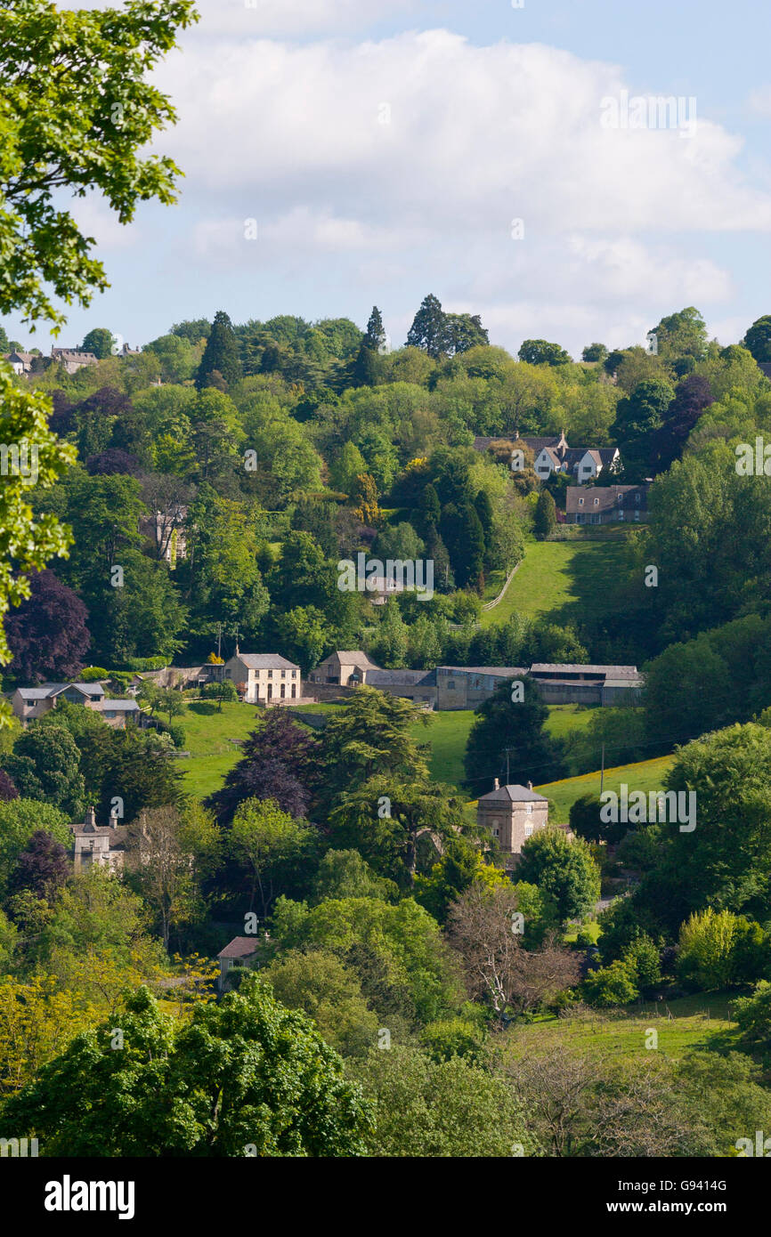 Homes on the wooded valley hillsides near Stroud, Gloucestershire, UK