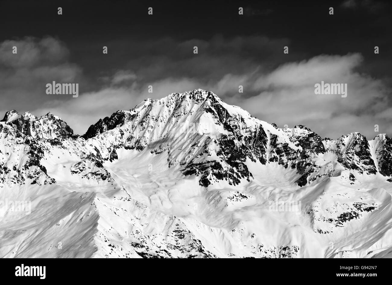 Black and white snowy mountains at sun day. Caucasus Mountains. Svaneti region of Georgia. Stock Photo