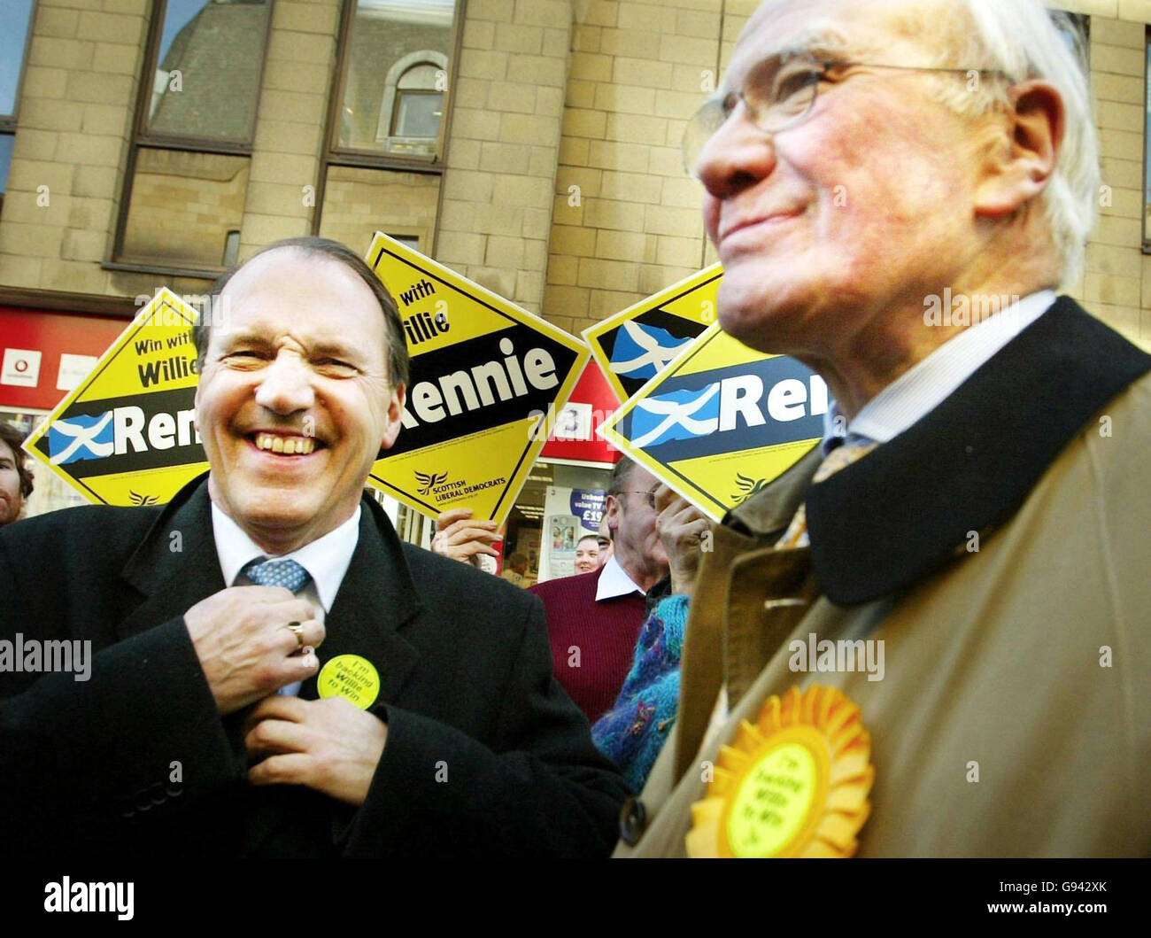 Liberal Democrat leadership contenders Sir Menzies (right) Campbell and Simon Hughes arrive in Dunfermline High Street, Friday February 10, 2006, after Willie Rennie, the triumphant new Liberal Democrat MP for Dunfermline and West Fife, said his shock by-election victory would 'rock the foundations of Downing Street - and I mean both No 10 and No 11'. The foundations are probably safe. But in the top floor flats there may have been some furrowed brows in the early hours of this morning. See PA Story POLL Dunfermline. PRESS ASSOCIATION Photo. Photo credit should read: David Cheskin/PA. Stock Photo