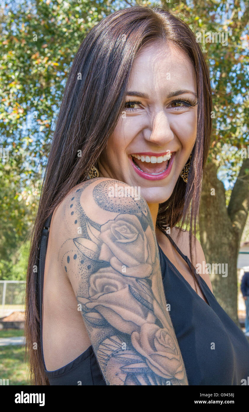 Tattoo radical woman aged 30 testimontal portrait modern ink shoulder Model Released, MR-3 Stock Photo