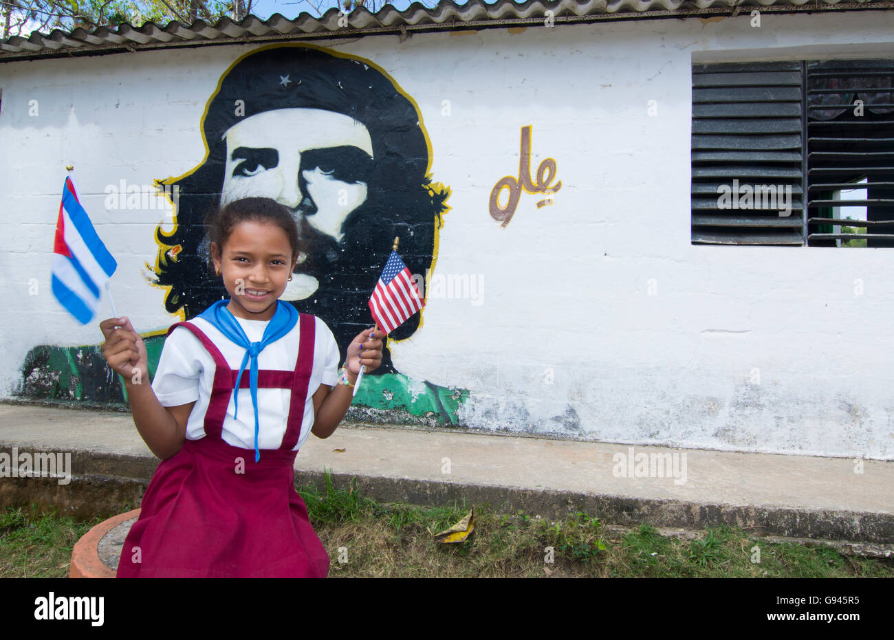 Las Terrazas Cuba elementary school student with American and Cuban