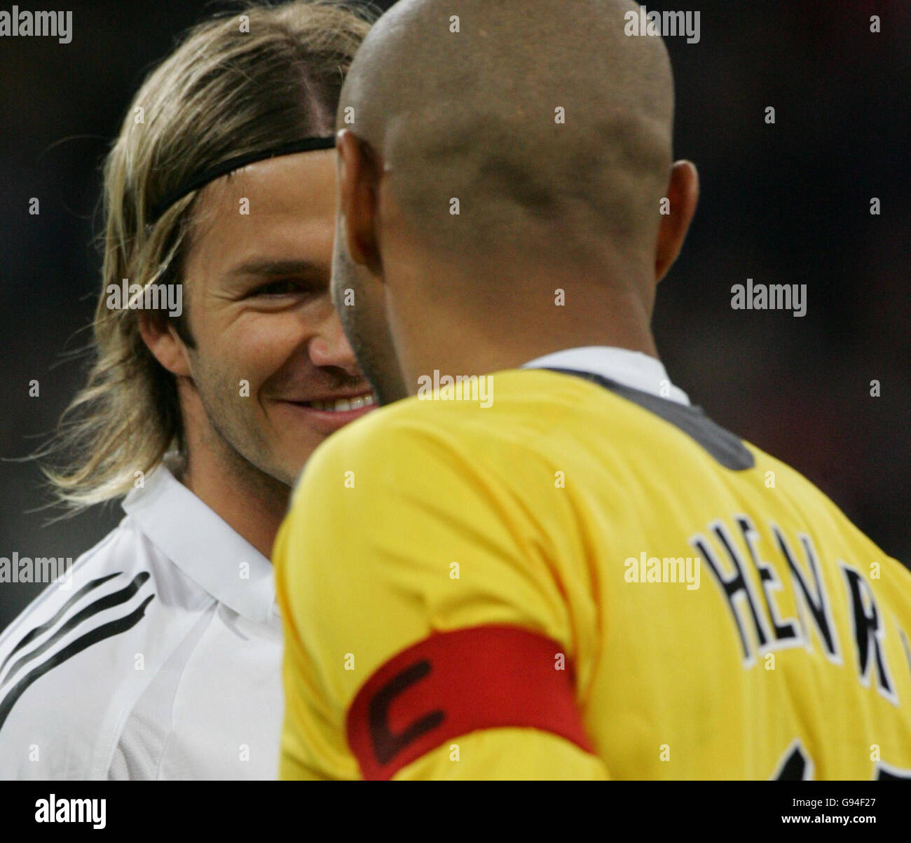 Real Madrid's David Beckham smiles at Arsenal Thierry Henry before the UEFA Champions League match at the Santiago Bernabeu, Madrid, Spain. Stock Photo