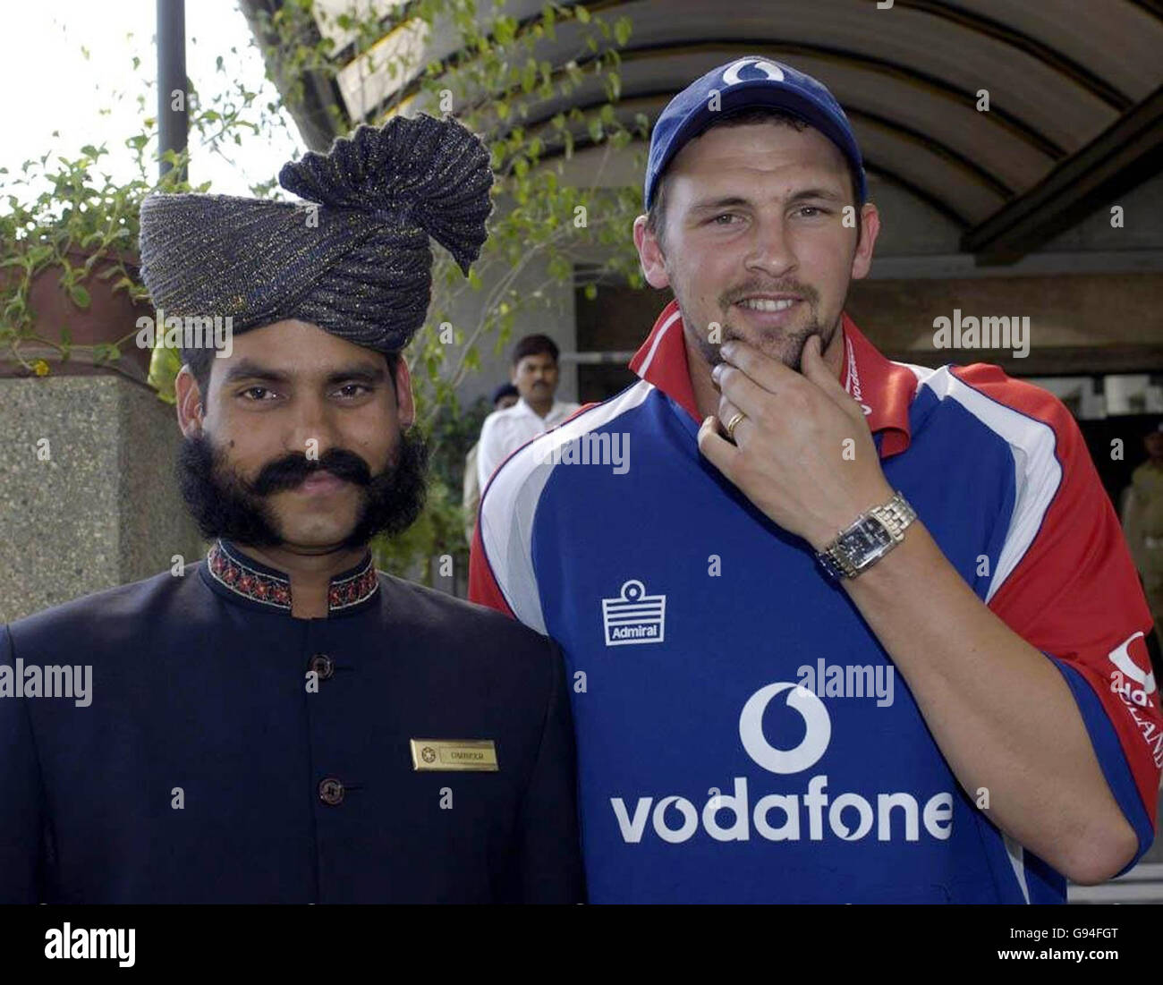 England fast bowler Steve Harmison (R) stands with the doorman at the team hotel in Baroda, India, Wednesday February 22, 2006. PRESS ASSOCIATION Photo. Photo credit should read: Rebecca Naden/PA. ***EDITORIAL USE ONLY - NO MOBILE PHONE USE*** Stock Photo