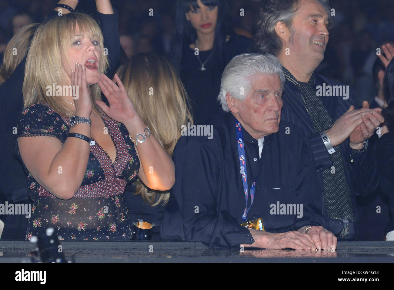 Paul Weller's father looks on with Coronation Street actress Sally Lindsay as Paul Weller performs on stage at the Brit Awards 2006, at Earls Court, west London, Wednesday 15 February 2006. See PA Story SHOWBIZ Brits. PRESS ASSOCIATION Photo. Photo credit should read: Yui Mok/PA Stock Photo