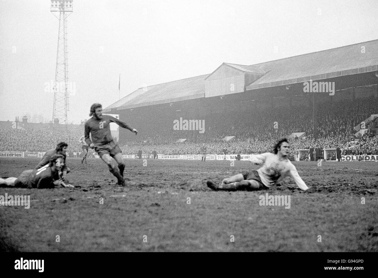 Orient's Barrie Fairbrother (third l) fires his team's winning goal past Chelsea's Dave Webb (r), watched by teammate Ian Bowyer (l, 11) and Chelsea goalkeeper Peter Bonetti (l) Stock Photo