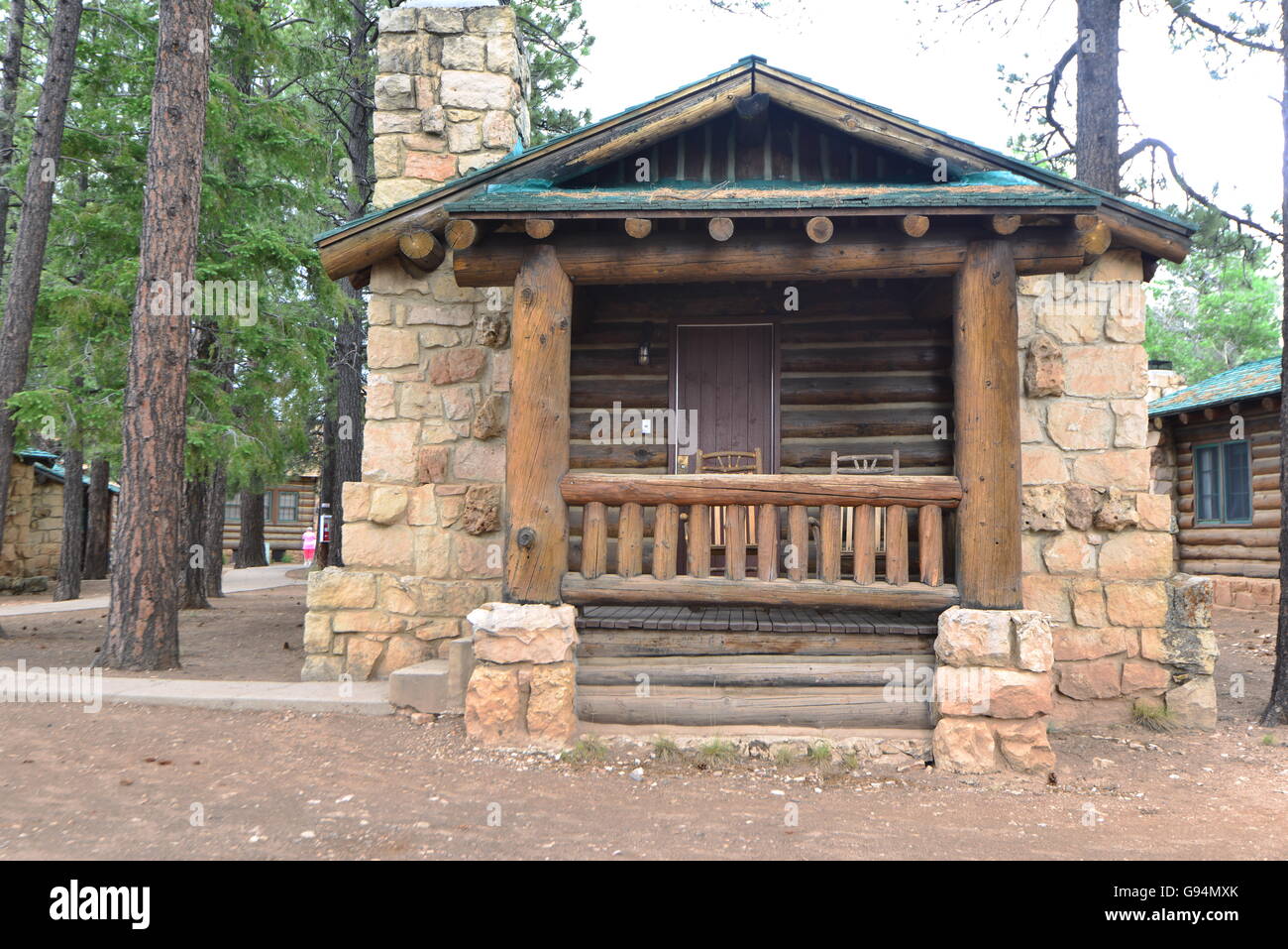 A Stone Log Cabin In The Mountains Of Arizona Stock Photo