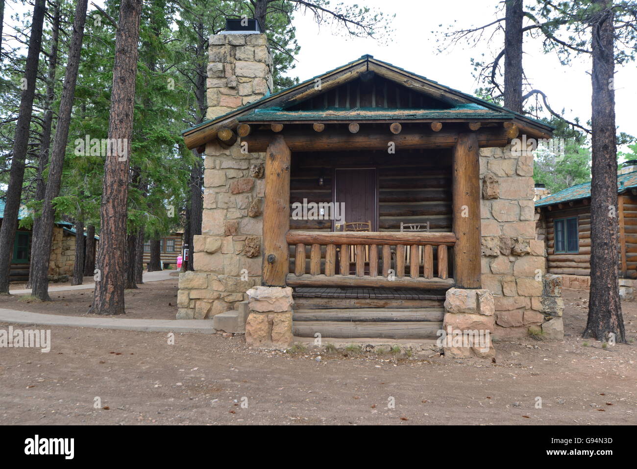 A Stone Log Cabin In The Mountains Of Arizona Stock Photo