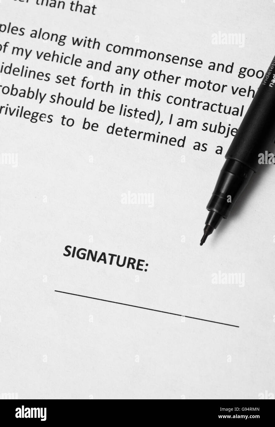 Business Contract Paper and Signature Stock Photo