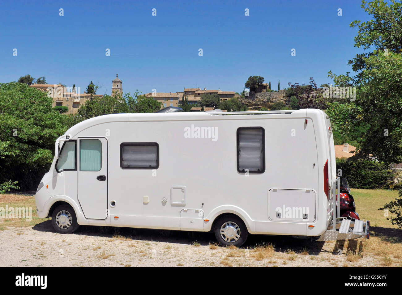 Camper at a camping in a village in France Stock Photo - Alamy