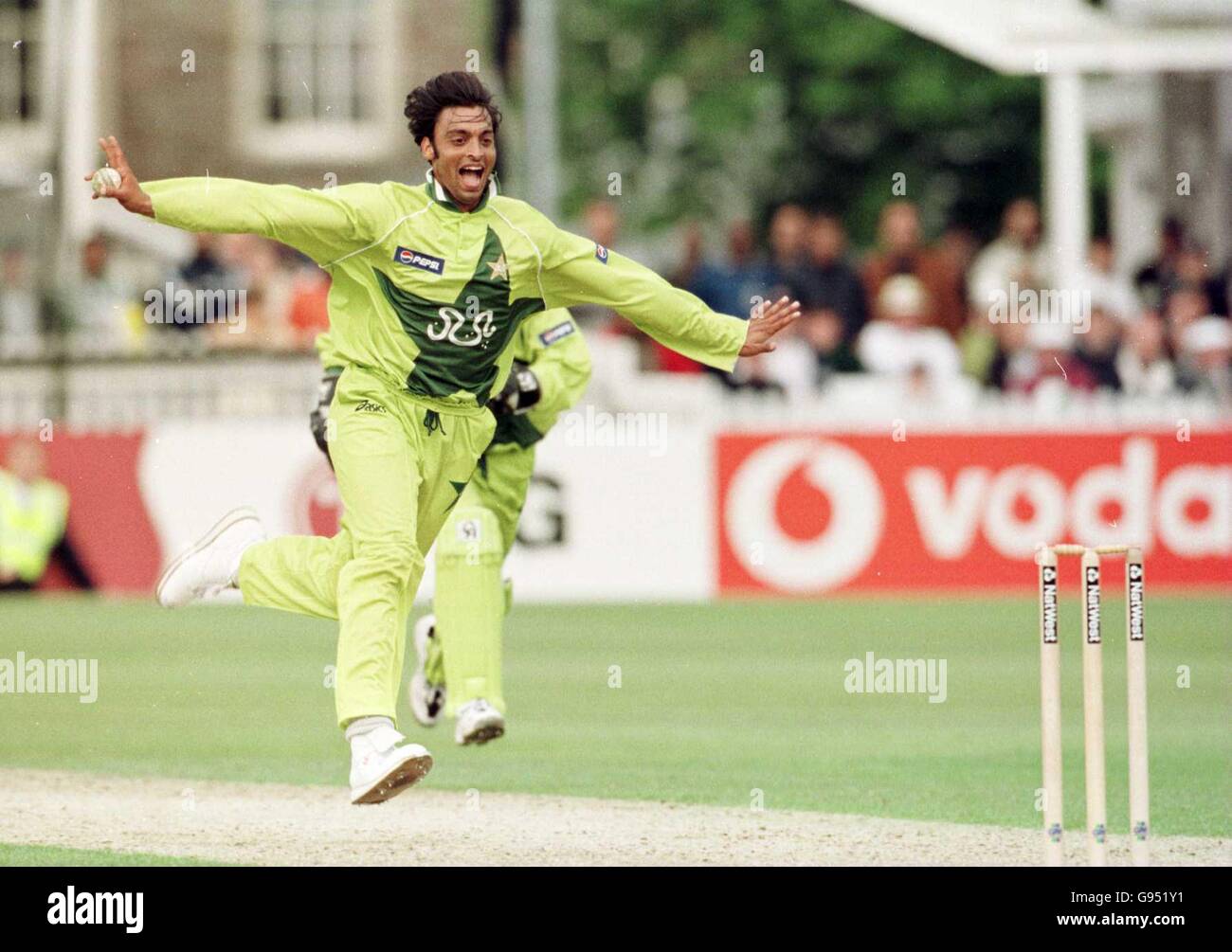 Pakistan bowler Shoaib Akhtar celebrates running down the wicket before running out Marvyn Dillon to earn victory over the West Indies Stock Photo