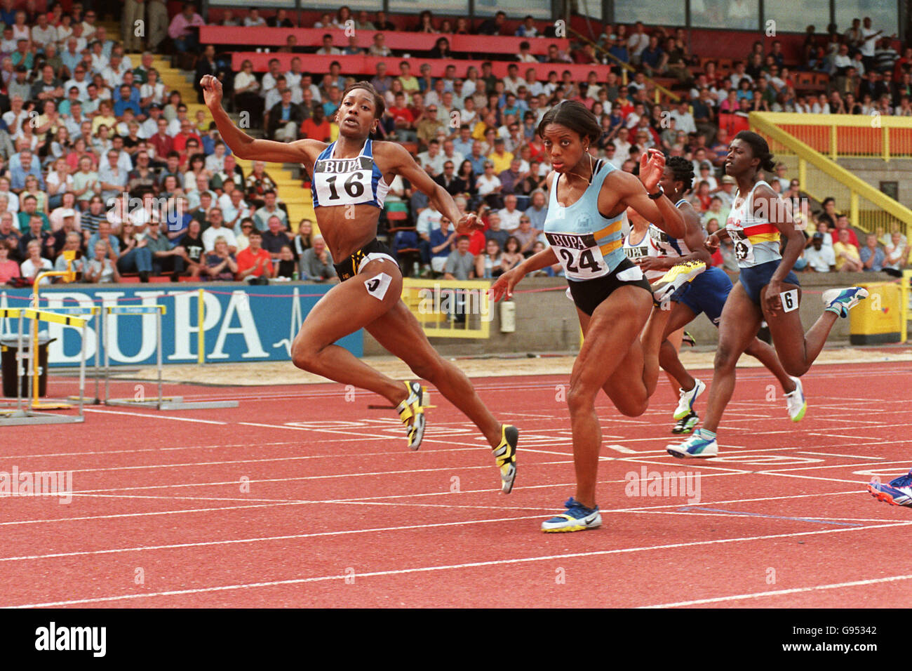 Joice Maduaka (left) comes home in first place ahead of Marcia Richardson (right) Stock Photo