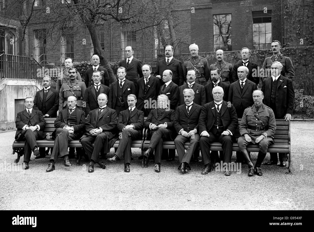Group photo taken in the garden of number 10 Downing Street. Front row (left to right): Leader of the Labour Party,Arthur Henderson; Sir Alfred Milner; Leader of the House of Lords, Lord Curzon; Chancellor of the Exchequer, Andrew Bonar Law; The Prime Minister, David Lloyd George; Prime Minister of Canada, Robert Borden; Joint Prime Minister of New Zealand, William Ferguson Massey; Commander-in-Chief South African Defence Force General Jan Christiaan Smuts; (Middle Row, left to right) Sir Satyendra Prasanno Sinha; Maharajah Ganga Singh; Sir James Scorgie Meston; Mr Austen Chamberlain; Stock Photo