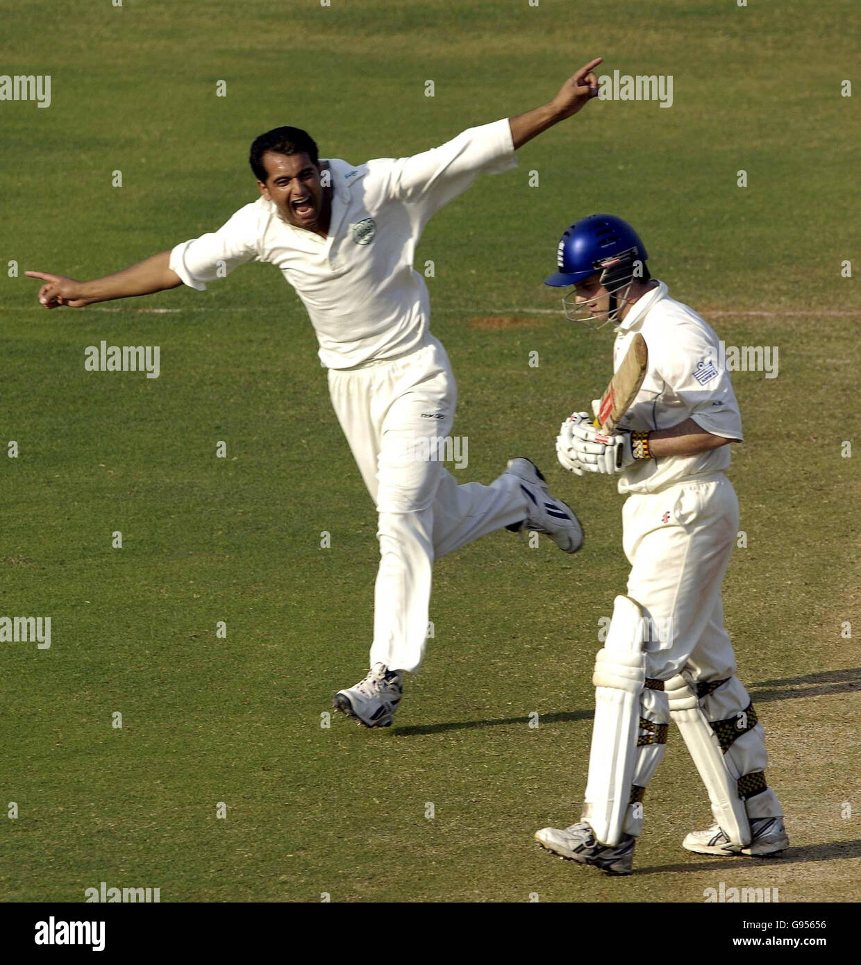 India's Abid Nabi celebrates the wicket of England's Andrew Strauss (R) during the second day of the opening tour match against the CCI Presidents XI at the Brabourne Stadium in Mumbai, India, Sunday February 19, 2006. PRESS ASSOCIATION Photo. Photo credit should read: Rebecca Naden/PA. Stock Photo