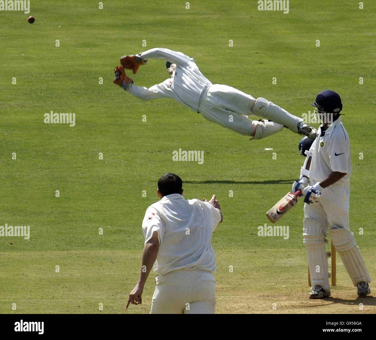 England wicketkeeper Geraint Jones dives to try and take a catch to dismiss Indian batsman Gautham Gambhir, off the bowling of Steve Harmison during the second day of the tour match against the Indian Board President's XI at the IPCL Cricket ground, Baroda, India, Friday February 24, 2006. See PA story CRICKET England. PRESS ASSOCIATION Photo. Photo credit should read: Rebecca Naden/PA. Stock Photo
