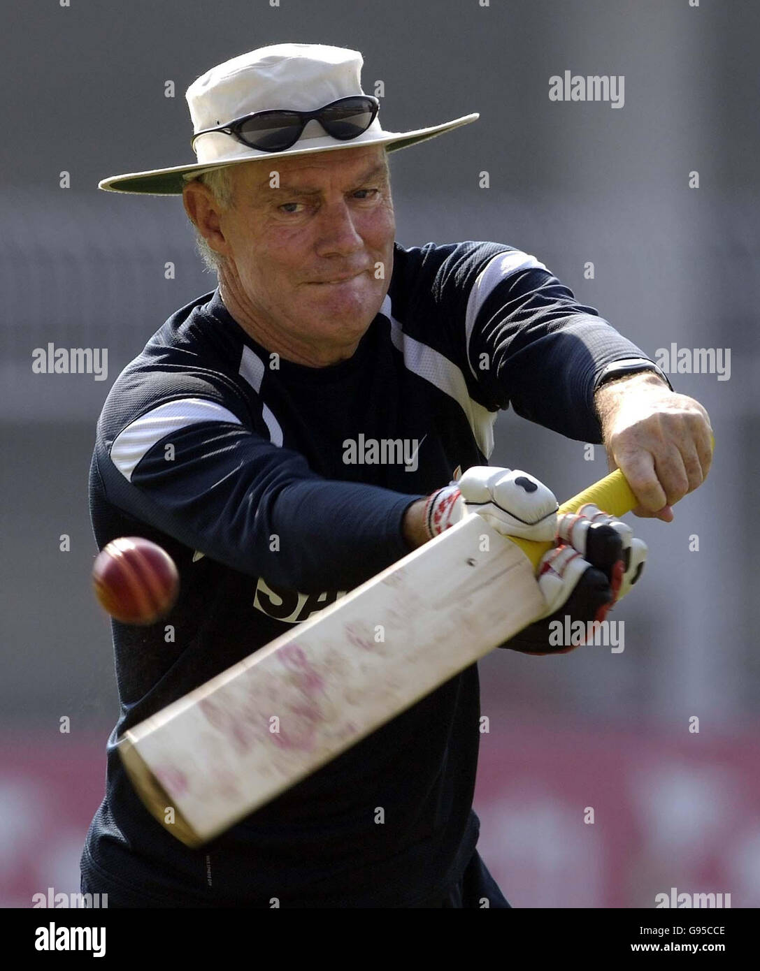 Indian coach Greg Chappell gives his players slip practice before the start of the fourth day of the first Test match at the Vidarbha Cricket Association ground, Nagpur, India, Saturday March 4, 2006. PRESS ASSOCIATION Photo. Photo credit should read: Rebecca Naden/PA. Stock Photo