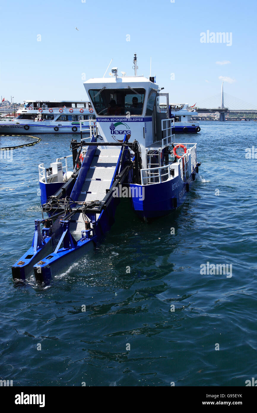 Istanbul, Turkey – July 7, 2015: Special ship for water scavenging in Golden Horn bay Stock Photo