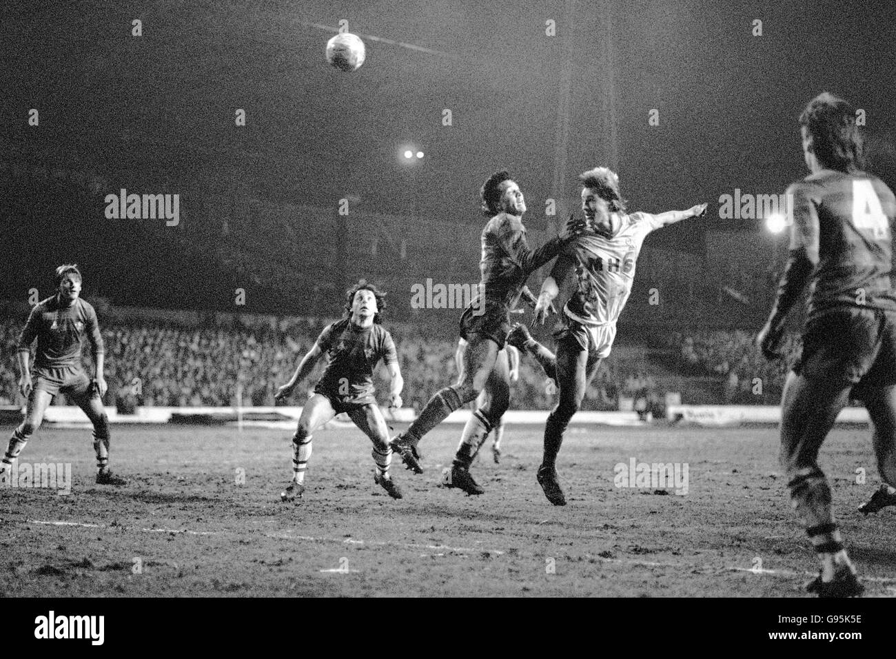 Sheffield Wednesday's Lee Chapman (r) beats Chelsea's Joey McLaughlin (c) to head the ball goalwards, watched by Chelsea's Mickey Thomas (second l) Stock Photo