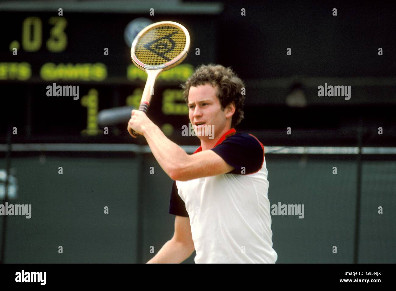 Tennis - Wimbledon 1982 - John McEnroe v Peter McNamee. John McEnroe takes a shot Stock Photo