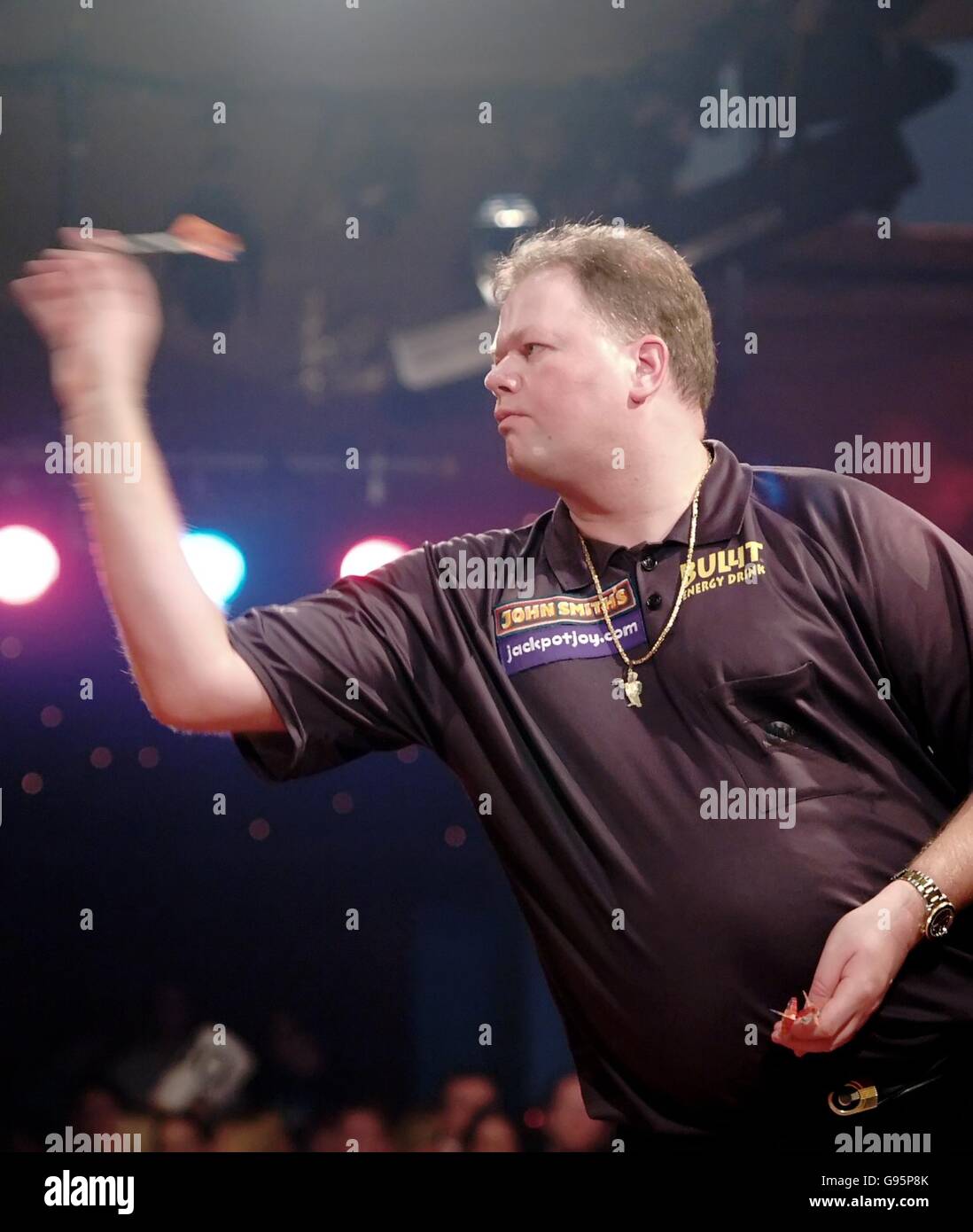 Raymond Barneveld of the Netherlands, during his semi-final match against England's Martin Adams, in the World Professional Men's Darts Championship at The Lakeside, Frimley Green, England. Stock Photo
