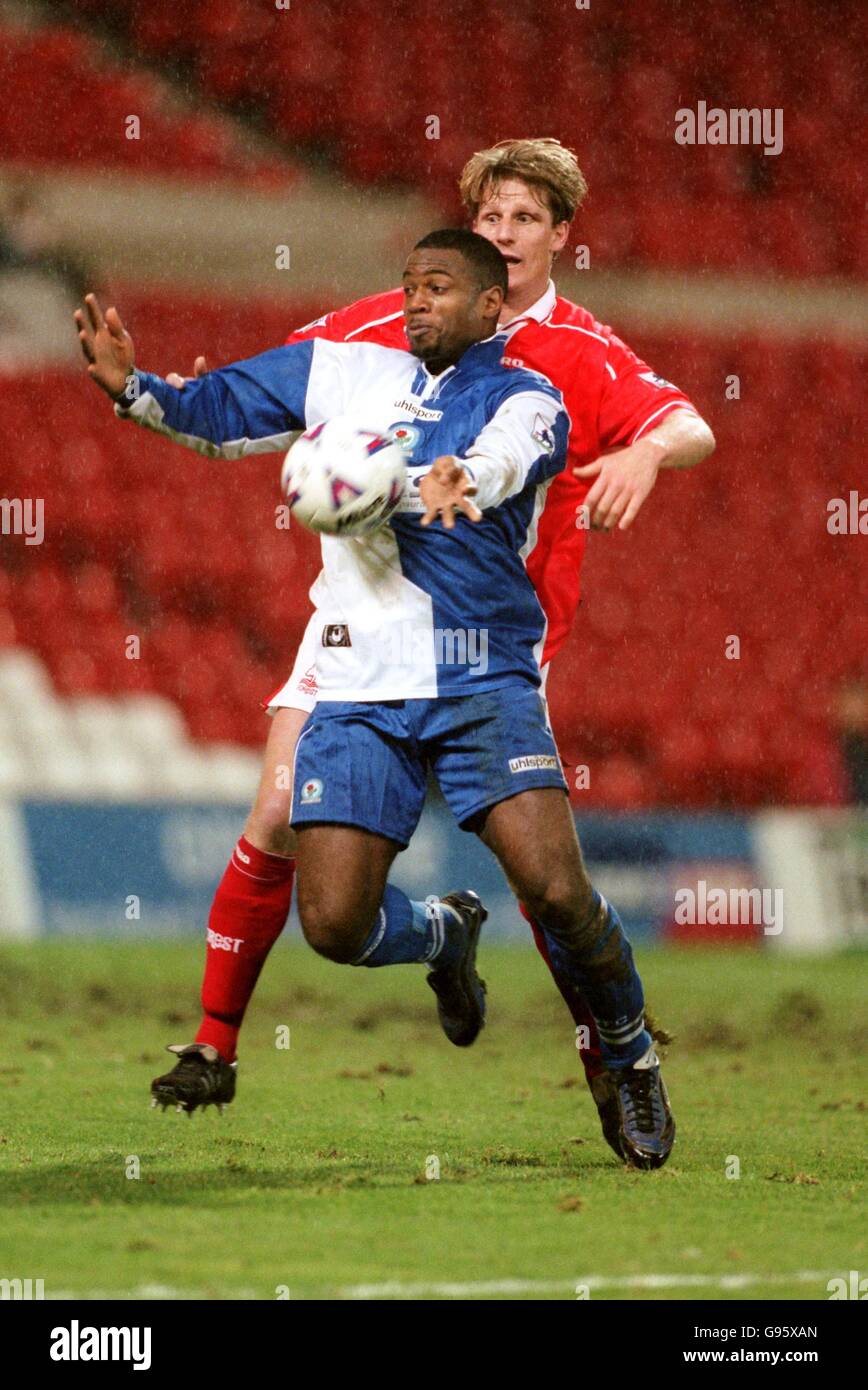 Nathan Blake of Blackburn Rovers (front) controls the ball on his chest under pressure from Jesper Mattsson of Nottingham Forest (back) Stock Photo