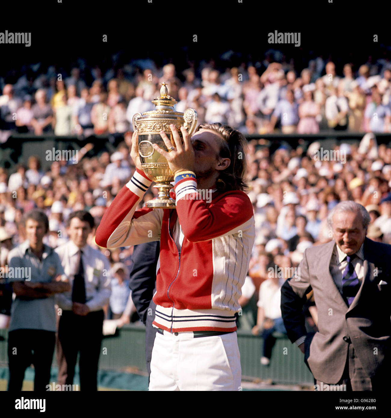 "Björn Borg holding Wimbledon trophy in celebration after victory"