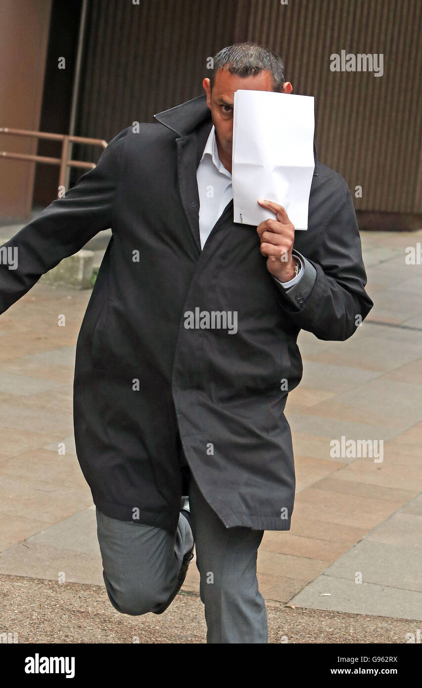 Jayson Lobo, 46, a police officer from Lancashire police and former 800metre runner for Great Britain, leaves Liverpool Crown Court, where he denied committing a string of voyeurism offences against eight women. Stock Photo