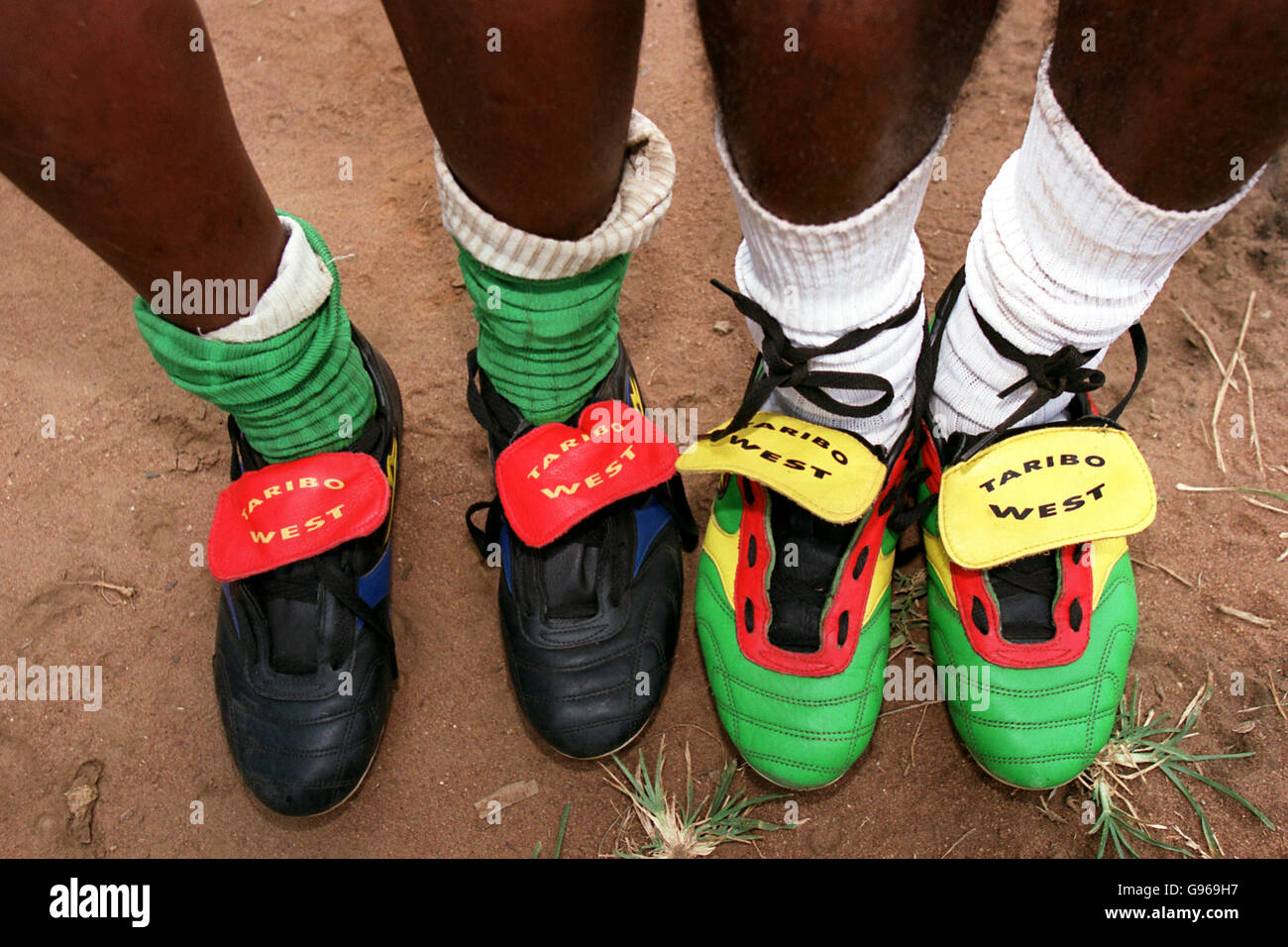 Soccer - FIFA World Youth Championships - Nigeria '99 - Taribo West Academy. Two members of the Taribo West Academy wearing Taribo West brand boots, donated by the Inter Milan star Stock Photo