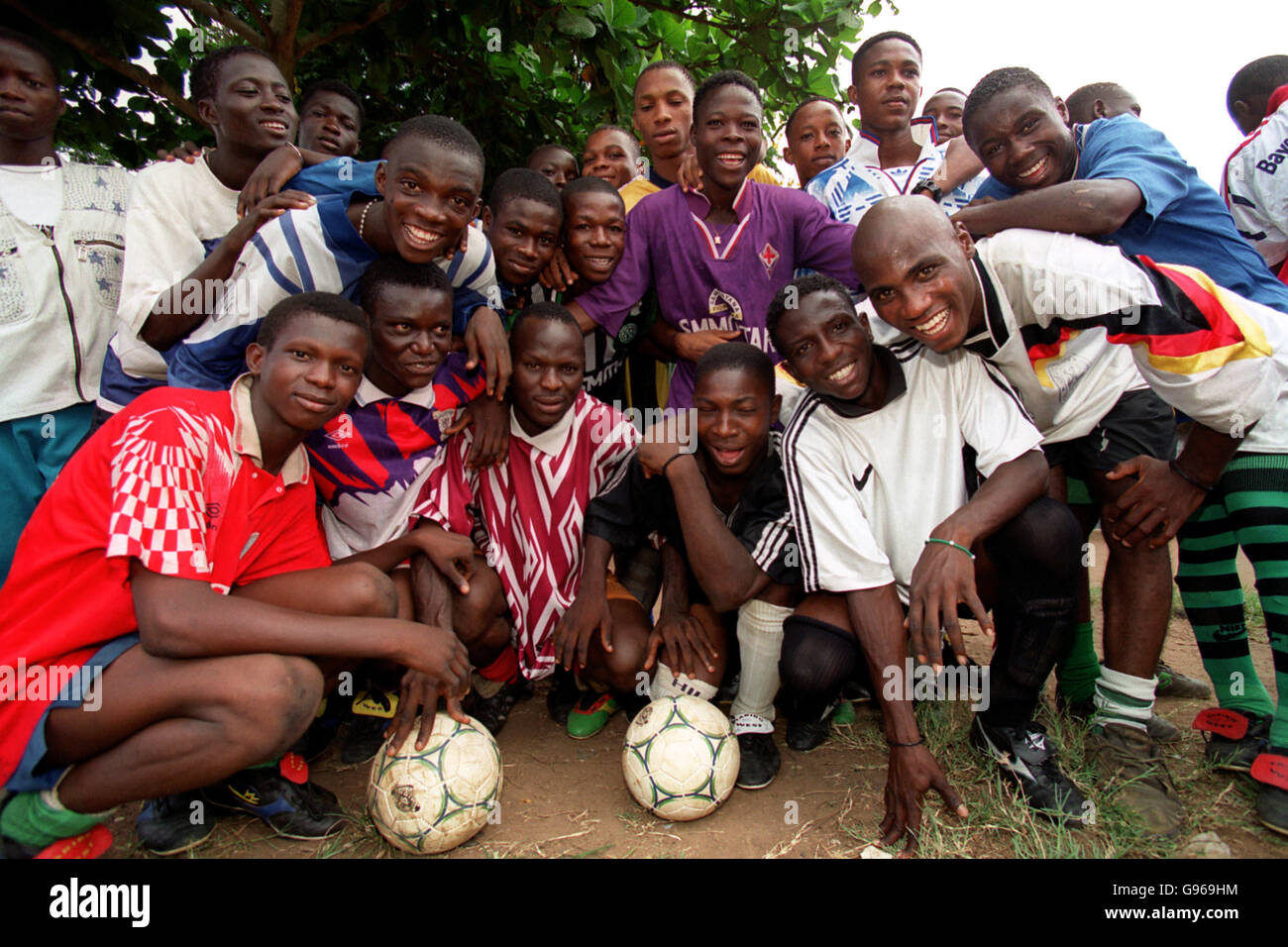 Nigerian soccer players at the Taribo West Academy in Tamuno, who receive kit and boots from Inter Milan's Taribo West Stock Photo