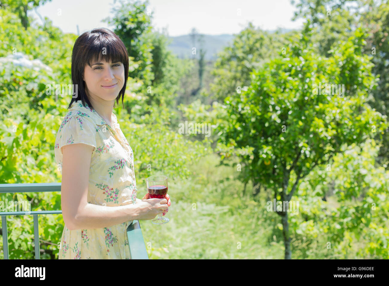 woman drinking red wine in a vineyard, outdoor Stock Photo - Alamy