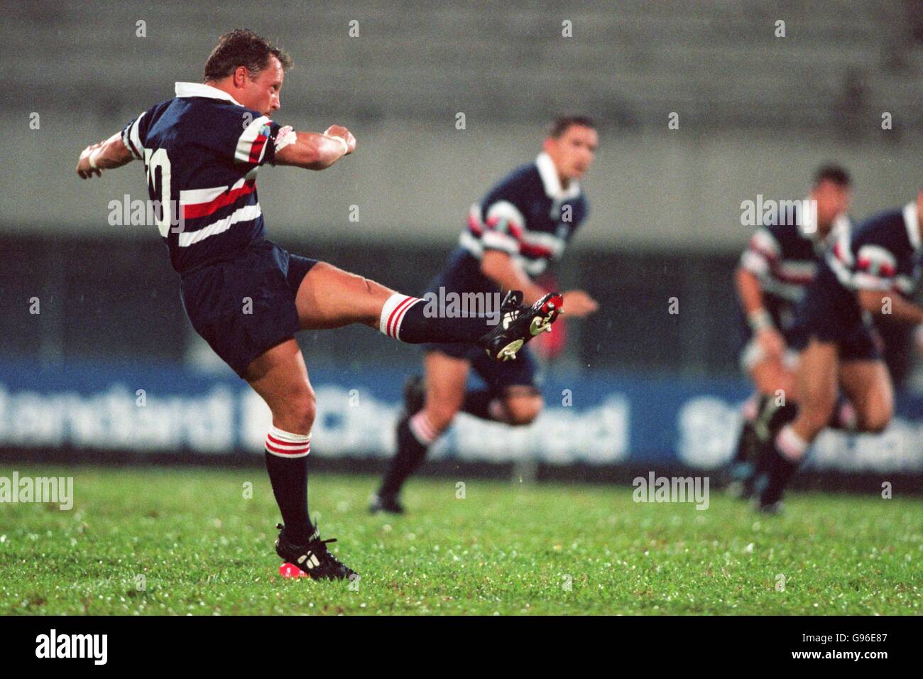 Rugby Union - 1999 World Cup - Asian Qualifying Zone - Singapore - Hong Kong v Korea. Hong Kong's Robin Bredbury kicks off Stock Photo