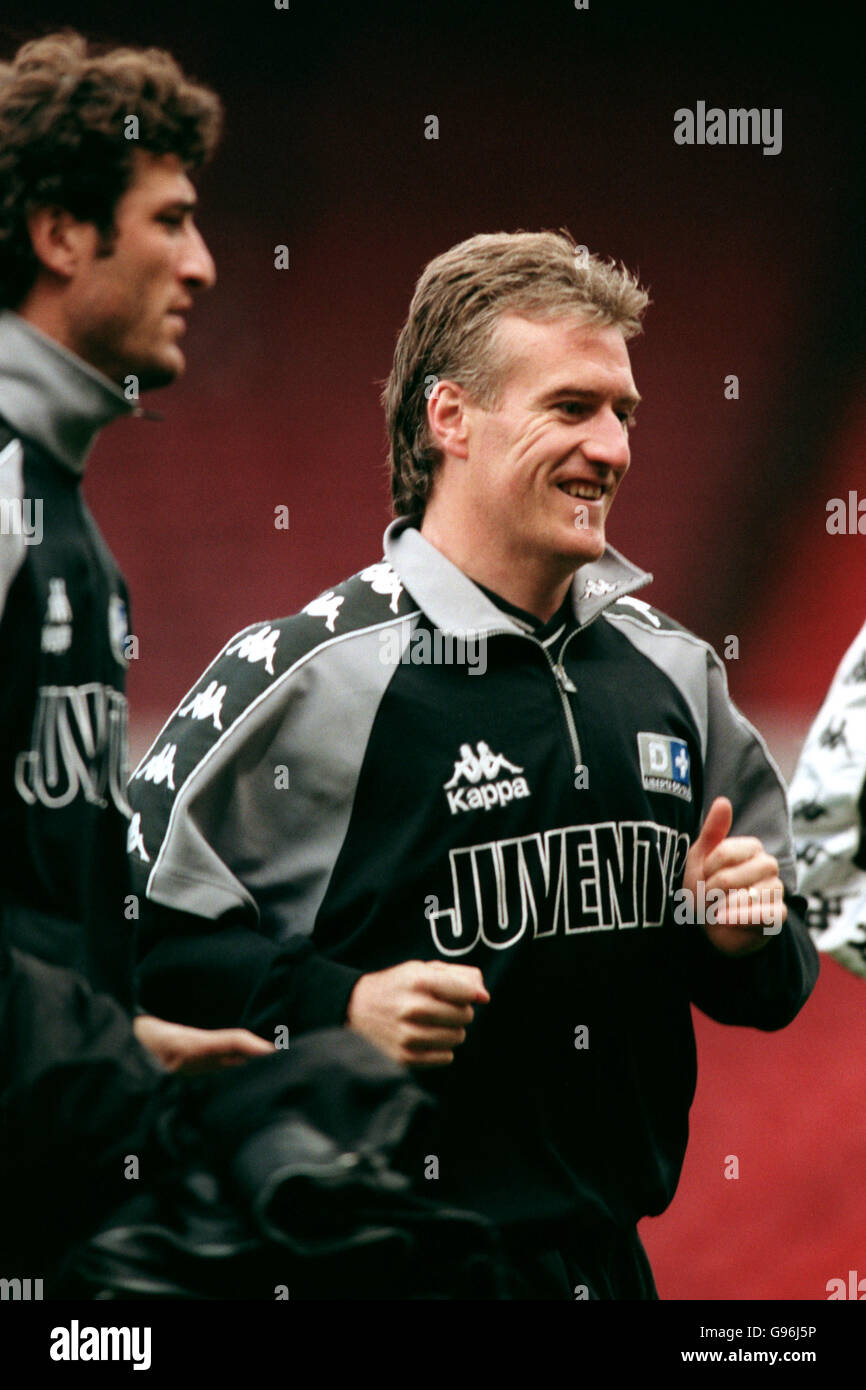 Didier Deschamps, a former Juventus and Chelsea midfielder as well as  ex-captain of the French team, waves during his official presentation as  new coach of Juventus soccer club, in Acqui Terme training