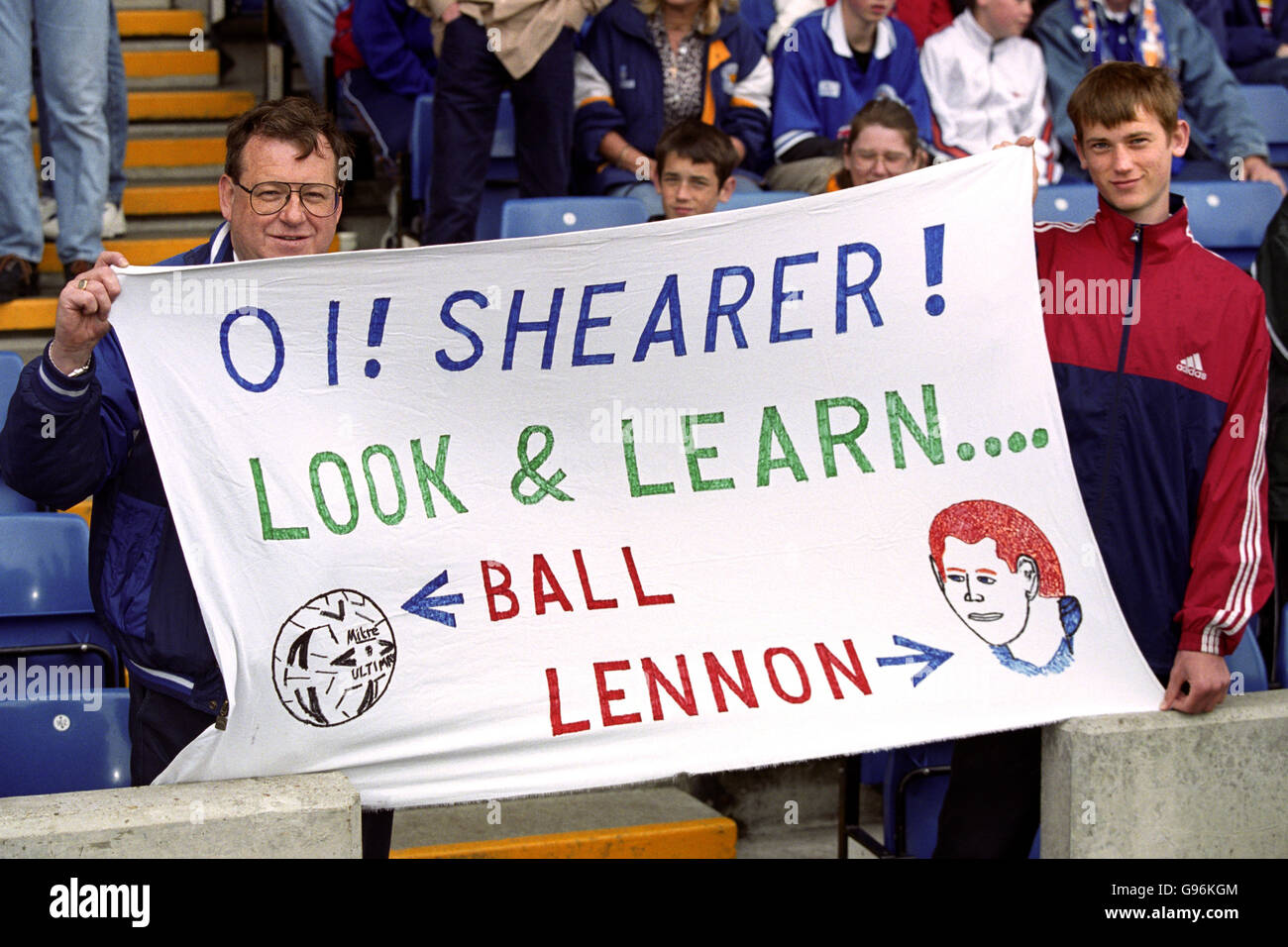 Leicester City fans hold up a banner referring to Alan Shearer's ...
