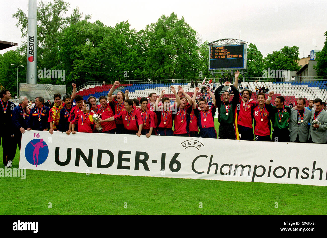 Soccer - European Under16 Championship - Final - Poland v Spain. The Spanish team celebrate with the trophy behind a UEFA Under16 Championship board Stock Photo