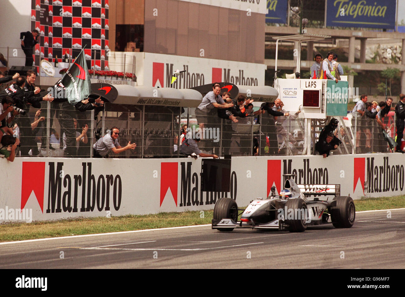 Formula One Motor Racing - Spanish Grand Prix. Mika Hakkinen celebrates