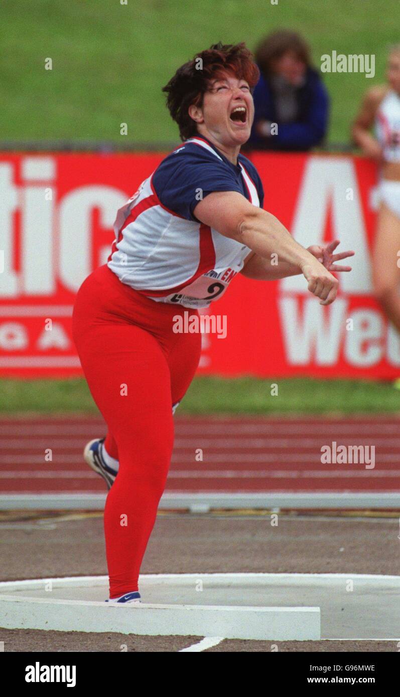 Judy oakes takes part in the womens shot put competition hires stock